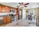Charming kitchen featuring stainless steel appliances, granite counters, breakfast table and modern cabinets at 6600 Sunset Way # 118, St Pete Beach, FL 33706