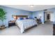 Spacious bedroom with ample closet space, a king bed, and neutral-toned walls at 6600 Sunset Way # 118, St Pete Beach, FL 33706