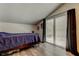 This bedroom has an outside entrance through the glass sliding door and windows on the top of the wall at 7320 Hideaway Trl, New Port Richey, FL 34655