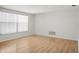 Bright bedroom with natural light, hardwood floors, and a serene atmosphere at 7814 Judith Cres, Port Richey, FL 34668
