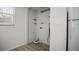 Clean, functional laundry room with modern flooring and fixtures at 7814 Judith Cres, Port Richey, FL 34668