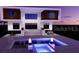 Stunning exterior featuring an inviting pool with fire features, and a modern home design for luxurious outdoor living at 7849 Marsh Pointe Dr, Tampa, FL 33635