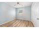 Cozy bedroom with closet, ceiling fan, neutral walls and floors at 801 Lamont Pl, Temple Terrace, FL 33617