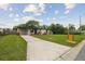 Inviting single Gathering home featuring a spacious driveway and well-kept lawn at 8108 Fir Dr, Tampa, FL 33619