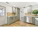 Kitchen featuring stainless steel appliances, new countertops, and modern cabinets at 8108 Fir Dr, Tampa, FL 33619