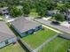 Charming single-story home boasts a well-manicured lawn and a fenced backyard, nestled in a quiet neighborhood at 10119 Rose Petal Pl, Riverview, FL 33578