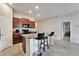 Open concept kitchen with granite island and breakfast bar seating at 10119 Rose Petal Pl, Riverview, FL 33578