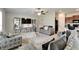 Comfortable living room with stylish decor, including a plush rug and modern furniture at 10119 Rose Petal Pl, Riverview, FL 33578