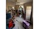 Cluttered bedroom with dresser and mirror in disarray at 1106 Trellis Ave, Spring Hill, FL 34606