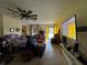Bright and sunny living room with lots of furniture and natural light at 1106 Trellis Ave, Spring Hill, FL 34606