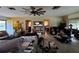 Open living room with views to other rooms and attached, enclosed patio at 1106 Trellis Ave, Spring Hill, FL 34606