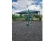 Community playground with swings and covered play area at 11940 Stone Pine St, Riverview, FL 33569