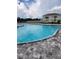 Community pool with brick surround, perfect for hot summer days at 11940 Stone Pine St, Riverview, FL 33569