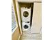 Convenient laundry closet with stacked Samsung washer and dryer units at 12249 Country White Cir, Tampa, FL 33635
