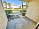 Screened patio with view of pond and neighboring townhomes at 12249 Country White Cir, Tampa, FL 33635