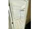 Spacious walk-in closet with wire shelving and light hardwood flooring, ideal for efficient storage solutions at 12249 Country White Cir, Tampa, FL 33635