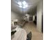 Bright living room featuring tile floors, neutral paint, and a ceiling fan at 1421 Mohrlake Dr, Brandon, FL 33511