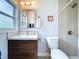 Updated bathroom featuring a modern vanity, stylish shower, and decorative tile accents at 1445 Coburn Dr, Tarpon Springs, FL 34689