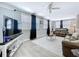 Cozy living room with modern floors, neutral walls, and comfortable furniture at 1445 Coburn Dr, Tarpon Springs, FL 34689