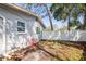 Cozy backyard with white fence and seating area at 1518 Cheyenne Ne St, St Petersburg, FL 33703