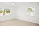 Bright, airy bedroom with natural light and neutral decor at 1518 Cheyenne Ne St, St Petersburg, FL 33703