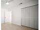Clean, well-lit bedroom featuring wood floors and an oversized closet at 1518 Cheyenne Ne St, St Petersburg, FL 33703