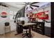 Eclectic office space with unique decor and a large window at 15316 Winding Creek Dr, Tampa, FL 33613