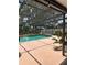 Inviting screened-in pool with spacious patio area for outdoor enjoyment at 15316 Winding Creek Dr, Tampa, FL 33613