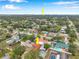 An aerial view shows the property's location, showcasing its neighborhood and proximity to city amenities at 1710 Townsend St, Clearwater, FL 33755