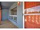 Welcoming front entrance featuring a vibrant door, ample natural light, and a cozy porch area at 1710 Townsend St, Clearwater, FL 33755