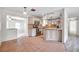 Bright kitchen featuring stainless steel appliances, granite countertops and island at 1710 Townsend St, Clearwater, FL 33755