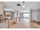Bright kitchen featuring stainless steel appliances, granite countertops and island with open floor plan at 1710 Townsend St, Clearwater, FL 33755