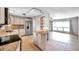 Bright kitchen featuring stainless steel appliances, granite countertops and island with open floor plan at 1710 Townsend St, Clearwater, FL 33755