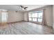 Spacious living room featuring large front windows, and views into the living spaces at 1710 Townsend St, Clearwater, FL 33755