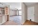 Open floor plan with living room visible from kitchen featuring new flooring at 1710 Townsend St, Clearwater, FL 33755