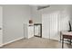 Calm bedroom featuring a dresser, closet, and desk, perfect for a peaceful retreat at 18419 Merseyside Loop, Land O Lakes, FL 34638