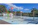 A colorful splash pad with various water features, perfect for Gathering fun on a sunny day at 18419 Merseyside Loop, Land O Lakes, FL 34638