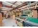Workshop interior with natural light, a workbench, and wood working equipment at 2140 Bow Ln, Safety Harbor, FL 34695