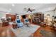 Spacious living room featuring hardwood floors, stylish furnishings, and ample natural light at 2140 Bow Ln, Safety Harbor, FL 34695