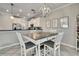 Dining area that showcases view into kitchen at 2155 Cerulean Sky Dr, Lutz, FL 33558