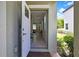 Inviting entryway with view into open floor plan and tile flooring at 2155 Cerulean Sky Dr, Lutz, FL 33558