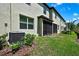 The exterior of the house has a screened-in porch and an air conditioning unit on the side of the house at 2155 Cerulean Sky Dr, Lutz, FL 33558