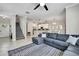 Spacious living room showcasing seamless flow into the kitchen and dining area at 2155 Cerulean Sky Dr, Lutz, FL 33558