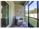 Comfortable screened porch perfect for enjoying the outdoors at 2155 Cerulean Sky Dr, Lutz, FL 33558