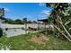 Spacious backyard with shed, covered area, mature trees, and space for outdoor activities at 2334 14Th N Ave, St Petersburg, FL 33713