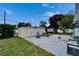 Backyard area has a patio, two storage sheds, and some trees at 2334 14Th N Ave, St Petersburg, FL 33713
