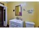 Bathroom vanity featuring a white sink and decorative mirror at 2334 14Th N Ave, St Petersburg, FL 33713