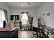 Bright bedroom with a window, TV, shelves, a mirror and desk workspace at 2334 14Th N Ave, St Petersburg, FL 33713