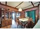 Inviting dining room featuring exposed brick walls and a classic wooden dining set at 2334 14Th N Ave, St Petersburg, FL 33713