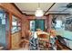 Dining room with exposed brick, wood floors, and a decorative table with seating for six at 2334 14Th N Ave, St Petersburg, FL 33713